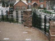 Welded aluminum fence with cast rose designs