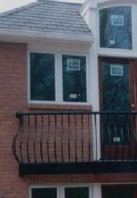 Round bar custom bowed picket balcony