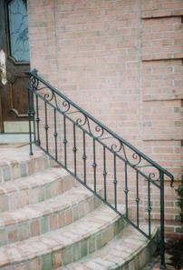 SCROLL TOP RAILING WITH COLLARS ON STAIR